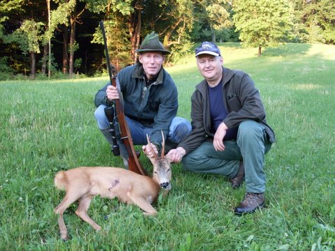 My first Rhoe Deer in Slovenia with my mentor Dusan. The hat & last bite placed in the mouth of the deer is tradition